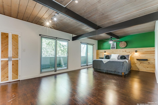 unfurnished bedroom with access to exterior, wood finished floors, wood ceiling, and beam ceiling