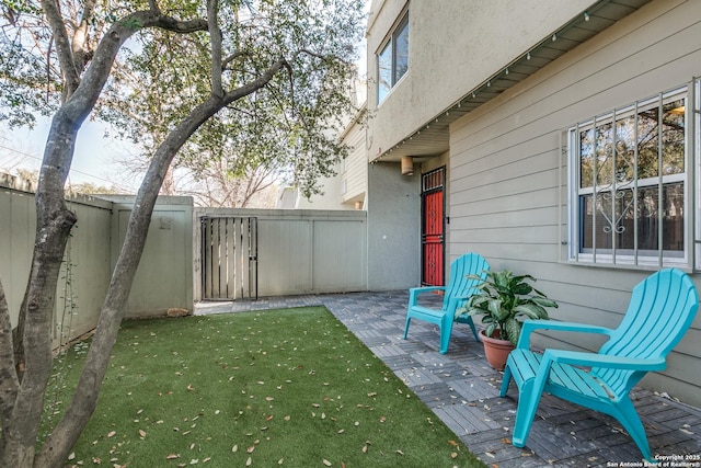 view of patio with a fenced backyard