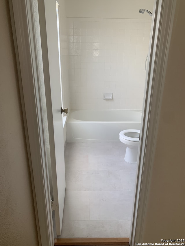 full bath featuring shower / bathing tub combination and toilet