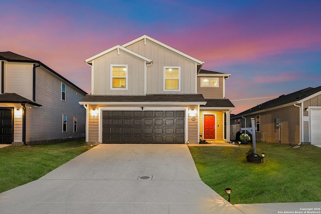 traditional-style house with a lawn, board and batten siding, driveway, and a garage