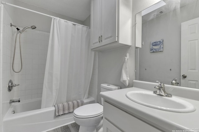 full bathroom with vanity, toilet, shower / tub combo, and wood finished floors