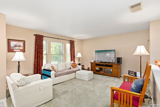 carpeted living room with visible vents