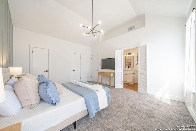 bedroom with visible vents, baseboards, carpet, a notable chandelier, and high vaulted ceiling