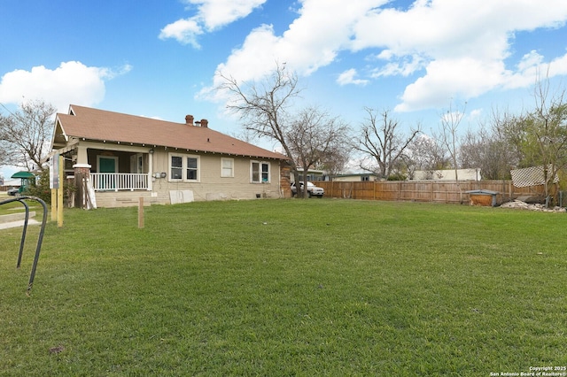 view of yard featuring fence