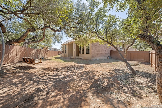 10619 Revolver Trl, San Antonio, TX 78254 - view of yard with a fenced backyard