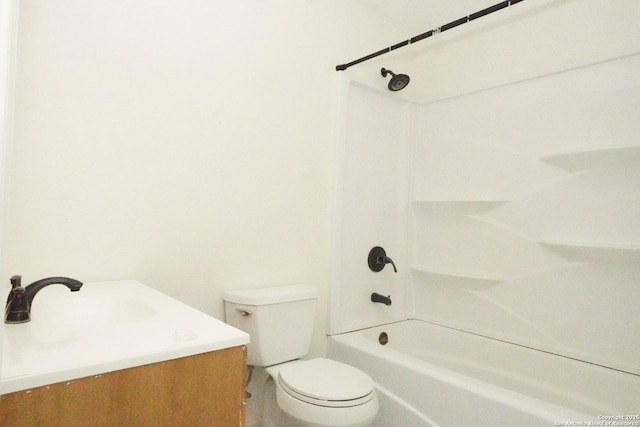 bathroom featuring tub / shower combination, toilet, and vanity