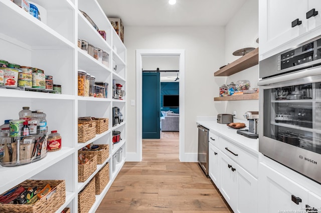 pantry with wine cooler