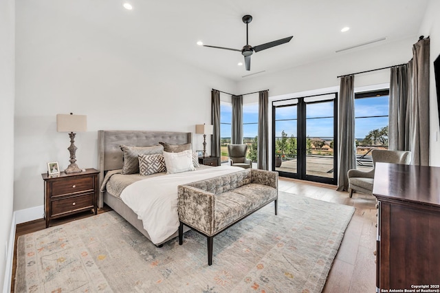 bedroom featuring visible vents, recessed lighting, light wood-style floors, and access to outside