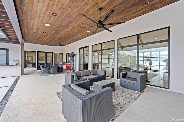 view of patio featuring an outdoor living space and ceiling fan