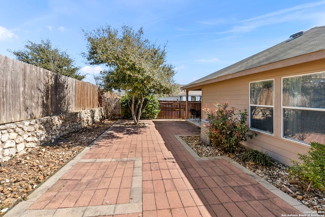 view of patio featuring a fenced backyard