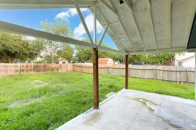 view of yard with a patio area and a fenced backyard