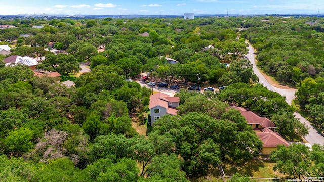 aerial view featuring a forest view