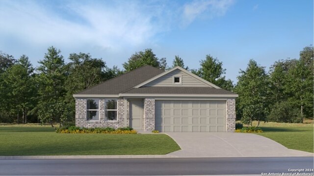 view of front of home with brick siding, an attached garage, concrete driveway, and a front lawn