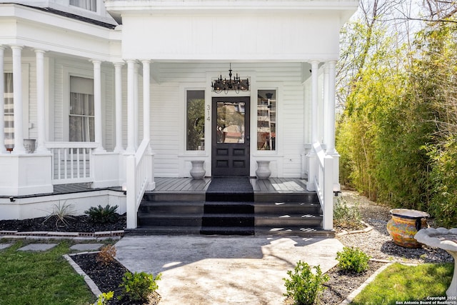 doorway to property featuring a porch