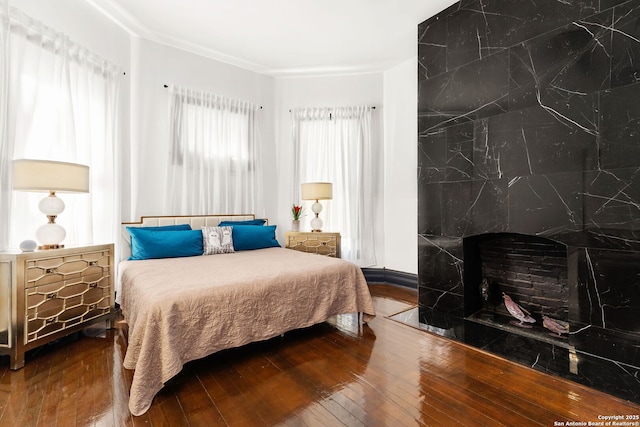 bedroom featuring wood-type flooring