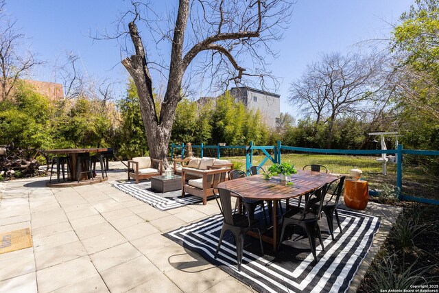 view of patio / terrace featuring outdoor dining space and outdoor lounge area