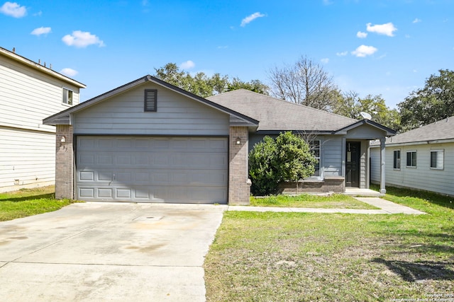 ranch-style home with an attached garage, a shingled roof, concrete driveway, a front lawn, and brick siding