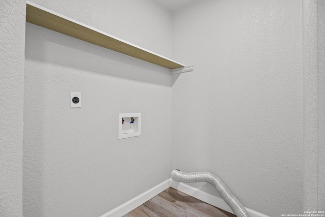 laundry room with wood finished floors, baseboards, hookup for an electric dryer, hookup for a washing machine, and laundry area