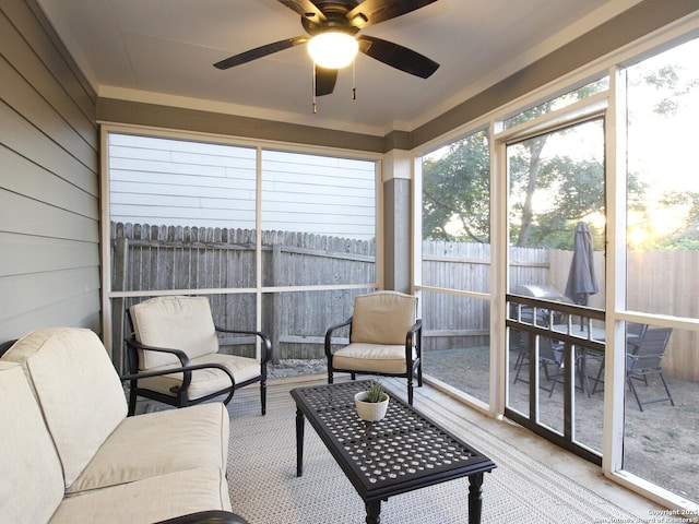 sunroom / solarium with ceiling fan