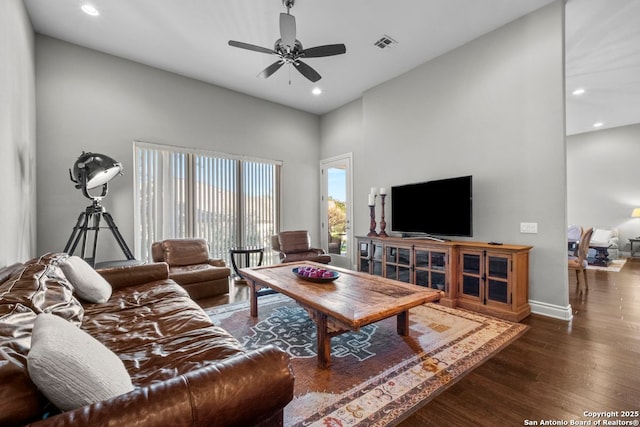 living area with wood finished floors, baseboards, visible vents, recessed lighting, and ceiling fan