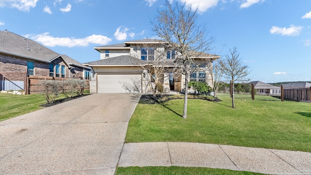 view of front of home with a garage, stucco siding, driveway, and a front yard