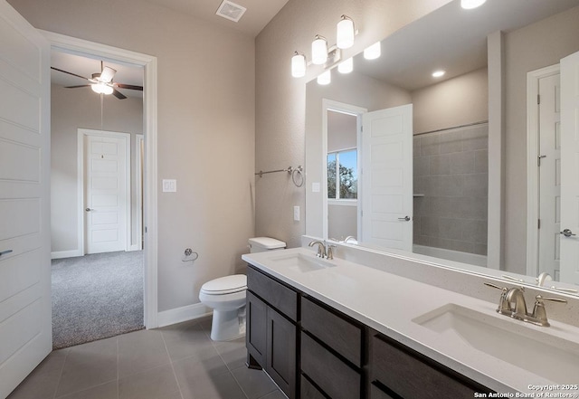 full bath with tile patterned floors, toilet, visible vents, and a sink