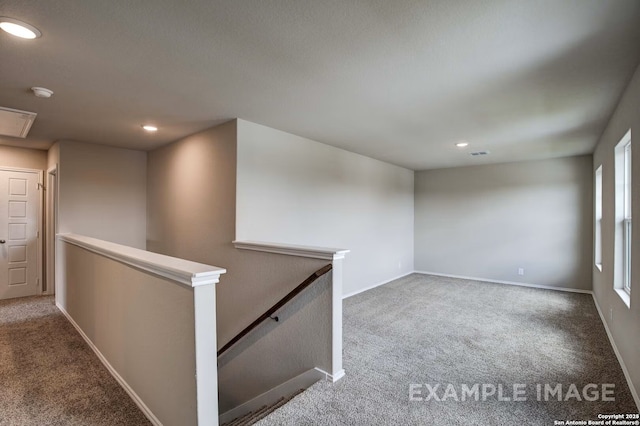 7015 Comanche Cave, San Antonio, TX 78247 - carpeted empty room featuring recessed lighting, visible vents, baseboards, and attic access