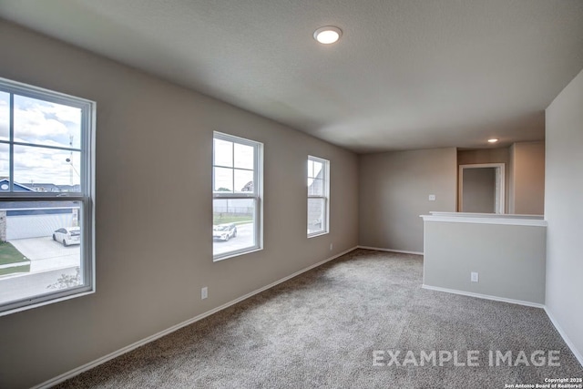 7015 Comanche Cave, San Antonio, TX 78247 - carpeted spare room featuring baseboards
