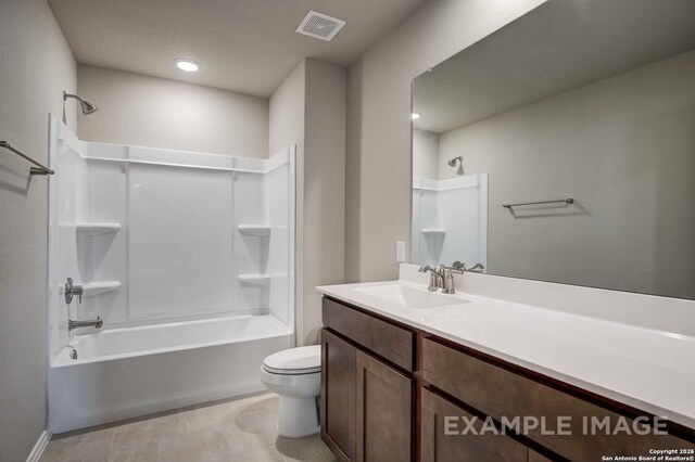 7015 Comanche Cave, San Antonio, TX 78247 - full bath featuring visible vents, toilet, shower / bathtub combination, tile patterned flooring, and vanity