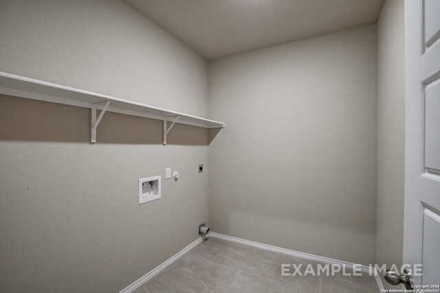 7015 Comanche Cave, San Antonio, TX 78247 - washroom with baseboards, hookup for an electric dryer, laundry area, washer hookup, and hookup for a gas dryer