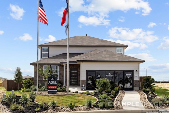 324 Jean St, Seguin, TX 78155 - view of property featuring an attached garage and fence
