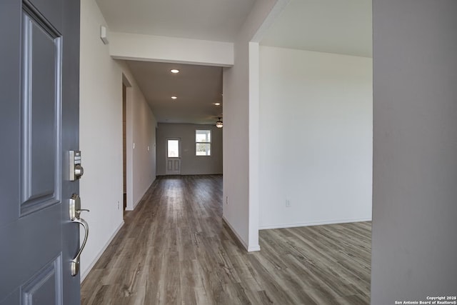 entryway with recessed lighting, a ceiling fan, baseboards, and wood finished floors