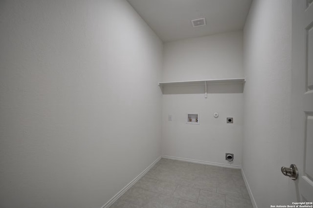 clothes washing area featuring hookup for a washing machine, baseboards, hookup for an electric dryer, laundry area, and hookup for a gas dryer