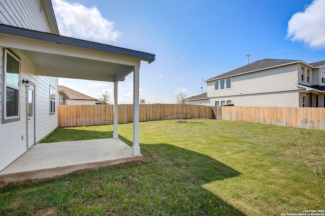 view of yard featuring a patio and a fenced backyard