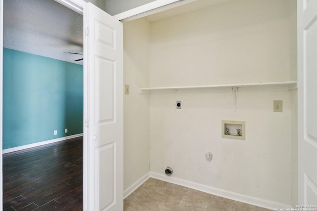 laundry area featuring hookup for a washing machine, baseboards, laundry area, electric dryer hookup, and hookup for a gas dryer