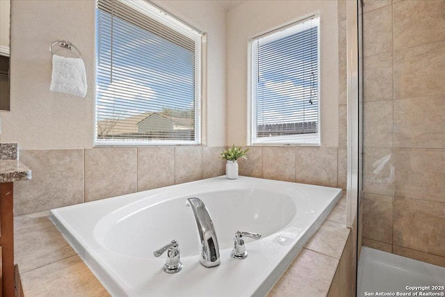 full bathroom with a garden tub