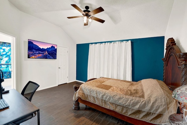 bedroom with baseboards, dark wood-style floors, a ceiling fan, and vaulted ceiling