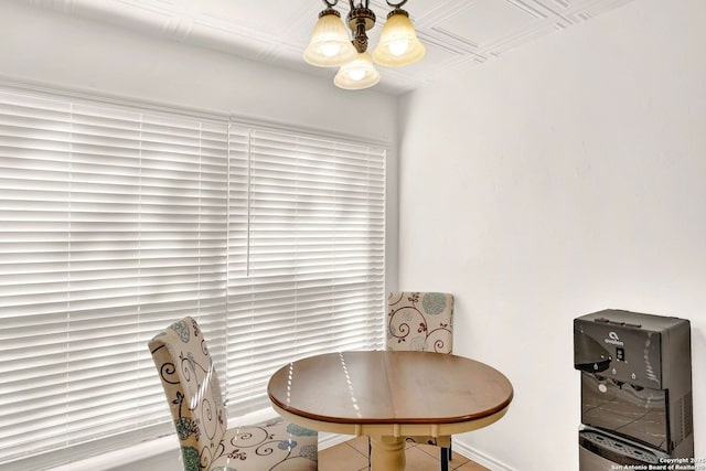 dining space featuring a notable chandelier