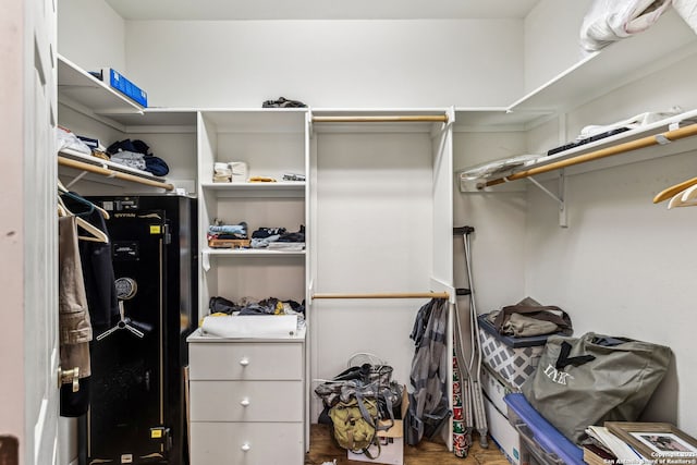 spacious closet with wood finished floors