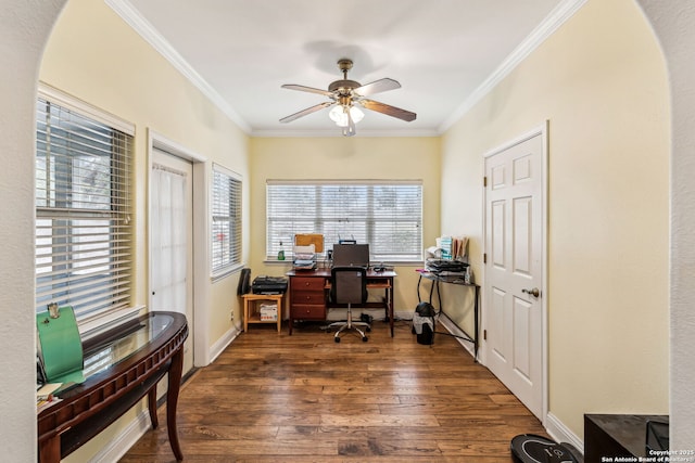 office area featuring baseboards, hardwood / wood-style floors, a ceiling fan, and ornamental molding