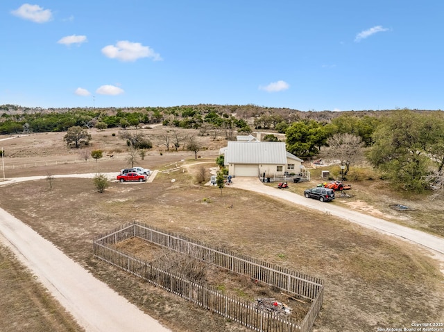 birds eye view of property featuring a rural view