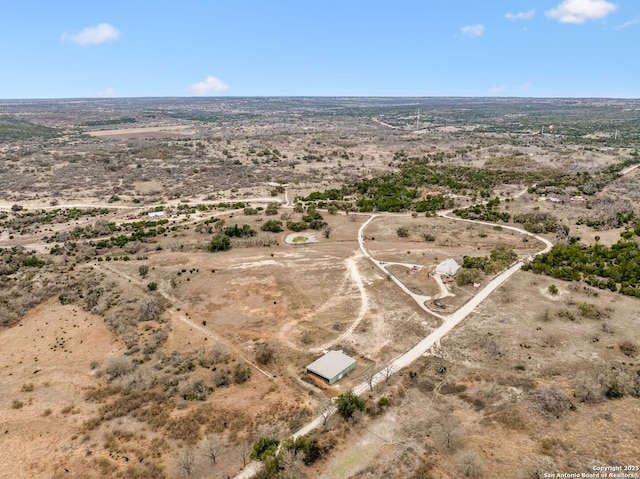 aerial view featuring a rural view and view of desert