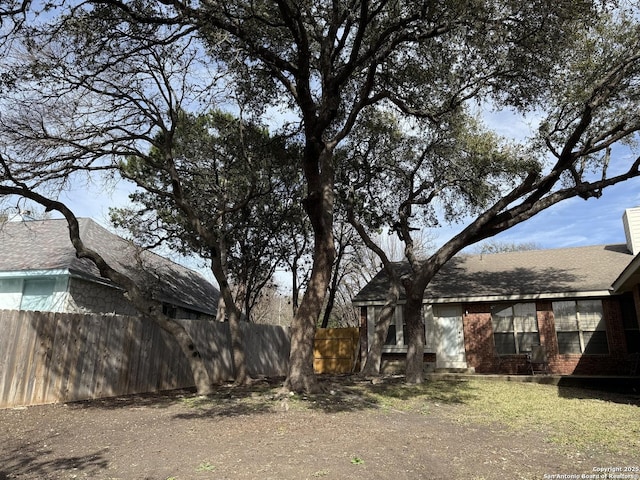 view of yard with fence