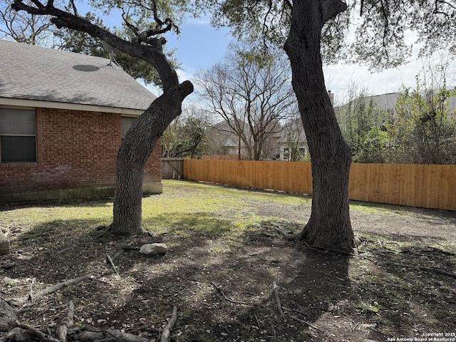 view of yard featuring fence