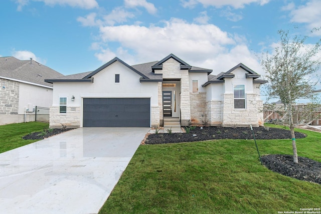 view of front of property with concrete driveway, a front lawn, and fence