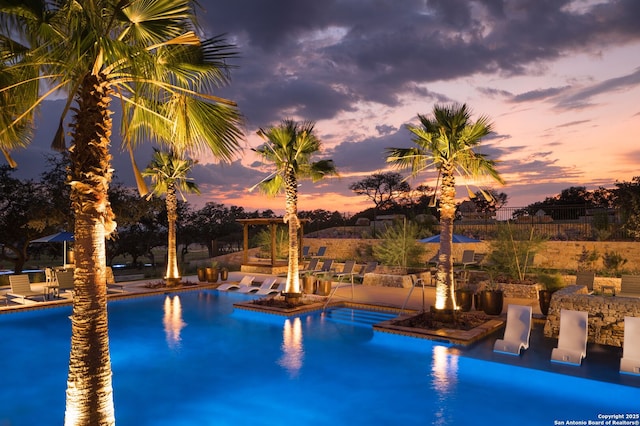 pool with a patio