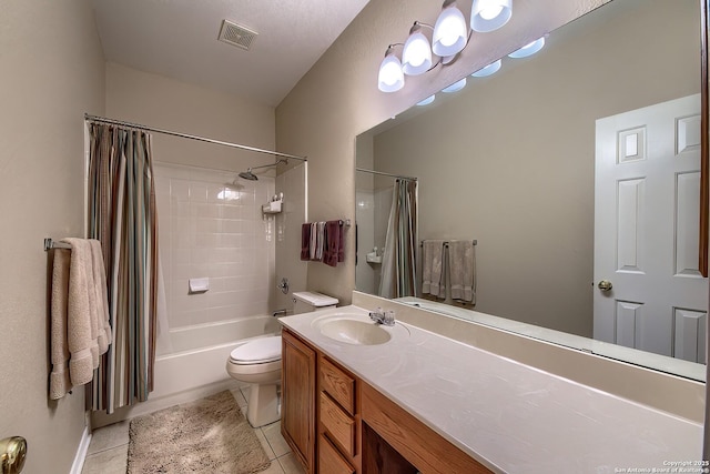 full bathroom with vanity, visible vents, tile patterned flooring, toilet, and shower / tub combo with curtain