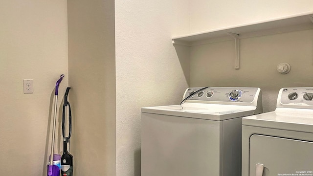 laundry area featuring laundry area and independent washer and dryer