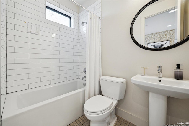 full bathroom with tile patterned flooring, toilet, baseboards, and shower / bathtub combination with curtain