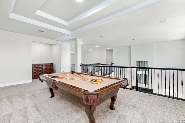 recreation room featuring visible vents, crown molding, a raised ceiling, and carpet floors